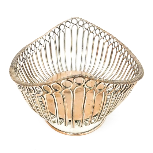 559 - A 19thC silver plate bread basket with open work detail. 11