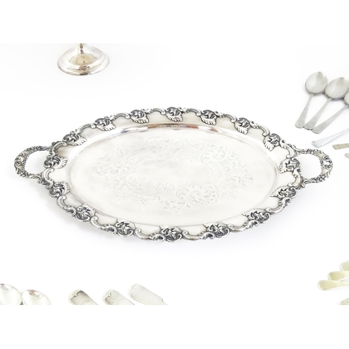 560 - A quantity of silver plated wares to include and oval tray, tazza, flatware / cutlery etc.