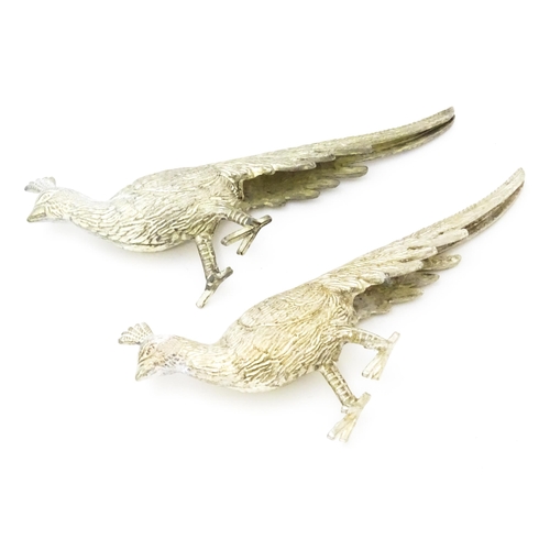 561 - Assorted silver plate menu / place card holders formed as pheasants together with 3 graduated models... 