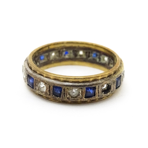 724 - A gold eternity ring set with sapphires and white stones. Together with assorted jewellery to includ... 