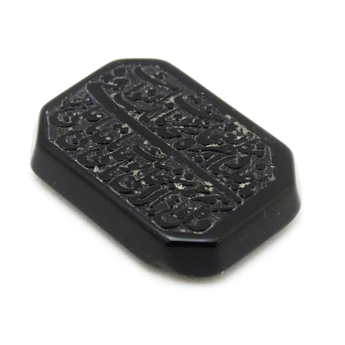 732 - A dark hardstone with Persian style script. Approx 1