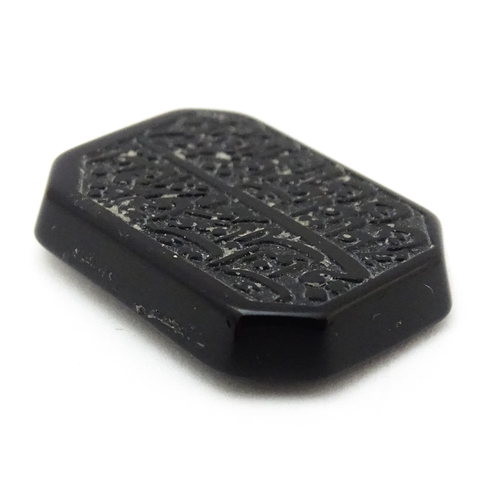 732 - A dark hardstone with Persian style script. Approx 1