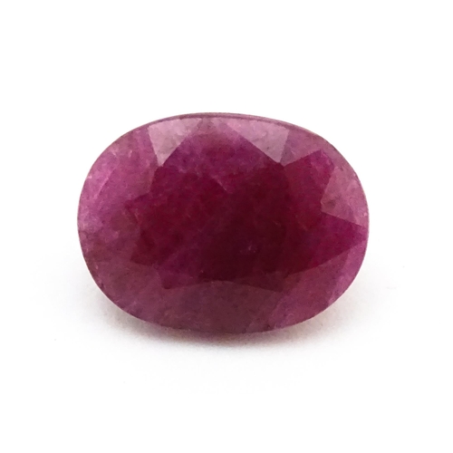 734 - A red spinel stone. Unmounted. Approx 1/2