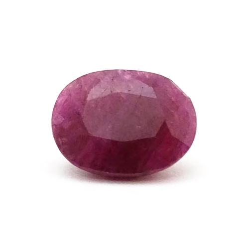 734 - A red spinel stone. Unmounted. Approx 1/2