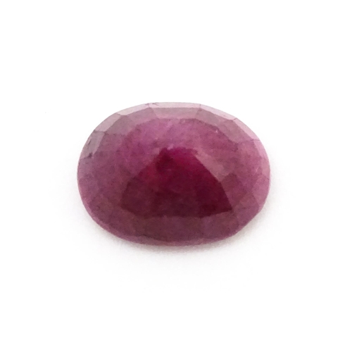 734 - A red spinel stone. Unmounted. Approx 1/2