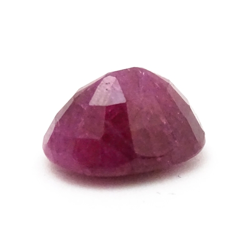 734 - A red spinel stone. Unmounted. Approx 1/2