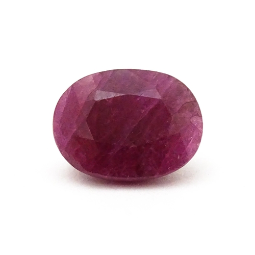 734 - A red spinel stone. Unmounted. Approx 1/2