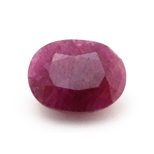 734 - A red spinel stone. Unmounted. Approx 1/2