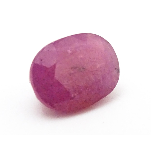 738 - A red spinel stone. Unmounted. Approx 3/8