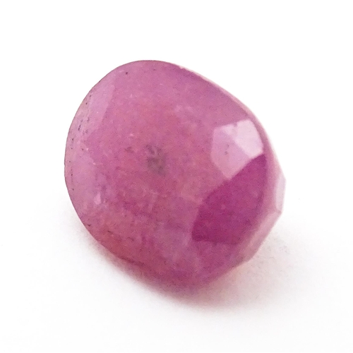 738 - A red spinel stone. Unmounted. Approx 3/8