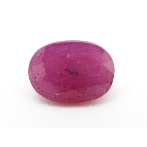 738 - A red spinel stone. Unmounted. Approx 3/8