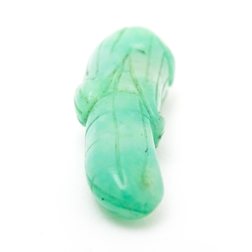 739 - An Oriental carved jade pendant modelled as corn on the cob. 1 3/4