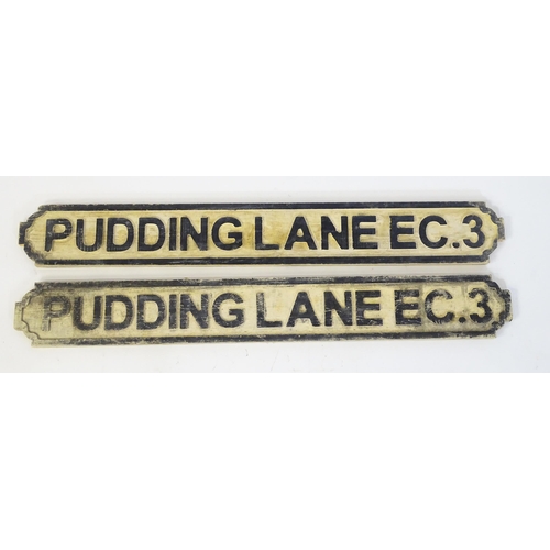 1260 - Two late 20thC carved wooden street / road signs for Pudding Lane EC. 3 (London), with painted detai... 