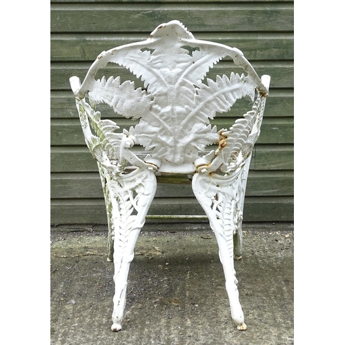 1307 - A Victorian cast iron chair with fern decoration. Marked with Victorian registration diamond and No.... 