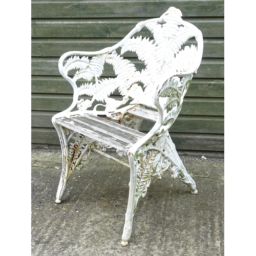 1307 - A Victorian cast iron chair with fern decoration. Marked with Victorian registration diamond and No.... 