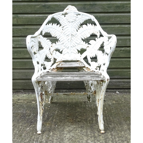 1307 - A Victorian cast iron chair with fern decoration. Marked with Victorian registration diamond and No.... 