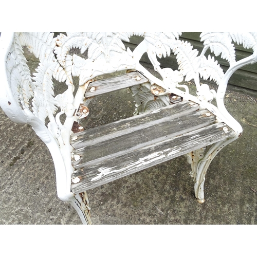 1307 - A Victorian cast iron chair with fern decoration. Marked with Victorian registration diamond and No.... 