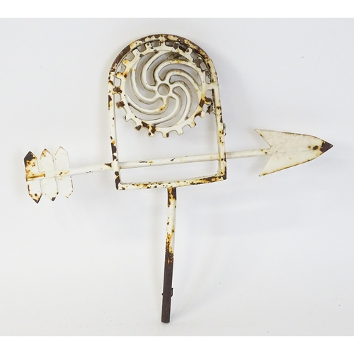 1310 - A 19thC white painted cast iron weather vane with stylised cog decoration. Approx 28