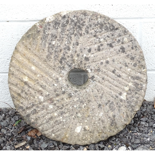 1311 - A mill stone wheel. Approx 19 1/2