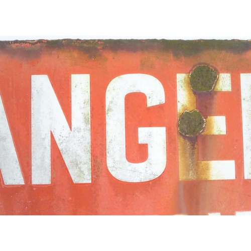 1316 - A mid 20thC enamel warning sign with red ground and white text 'Danger 3,300 Volts'. Approx 18