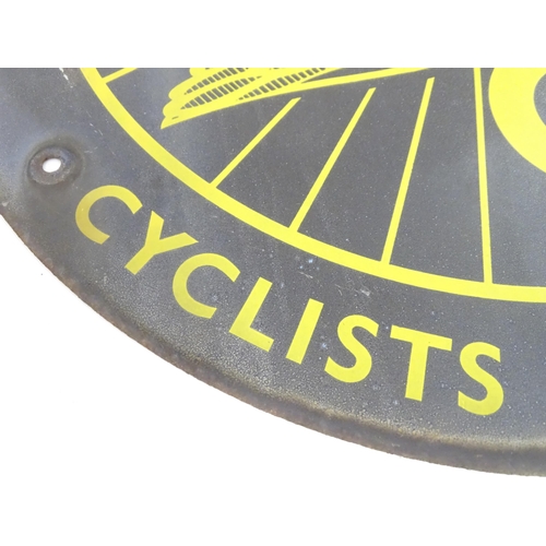 1325 - A 20thC advertising enamel sign of circular form for Cyclists Touring Club. Approx 15 3/4
