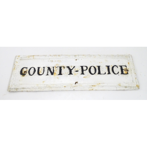 1331 - Local Buckinghamshire Interest: A 20thC monochrome cast sign 'County - Police'. Reputed to have been... 