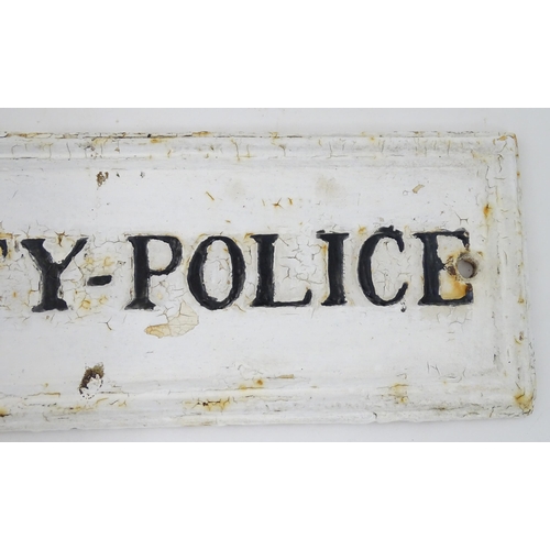 1331 - Local Buckinghamshire Interest: A 20thC monochrome cast sign 'County - Police'. Reputed to have been... 