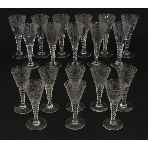 295 - A quantity of various crystal drinking glasses with cut decoration and etched rose detail, to includ... 