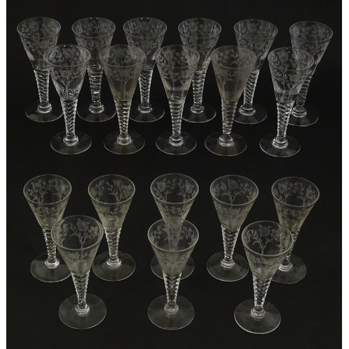 295 - A quantity of various crystal drinking glasses with cut decoration and etched rose detail, to includ... 