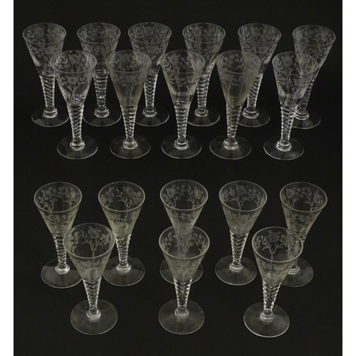 295 - A quantity of various crystal drinking glasses with cut decoration and etched rose detail, to includ... 