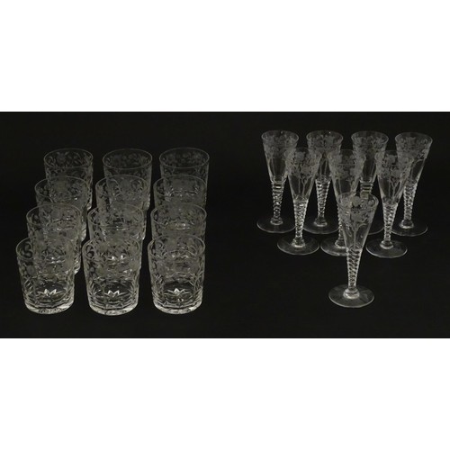 295 - A quantity of various crystal drinking glasses with cut decoration and etched rose detail, to includ... 