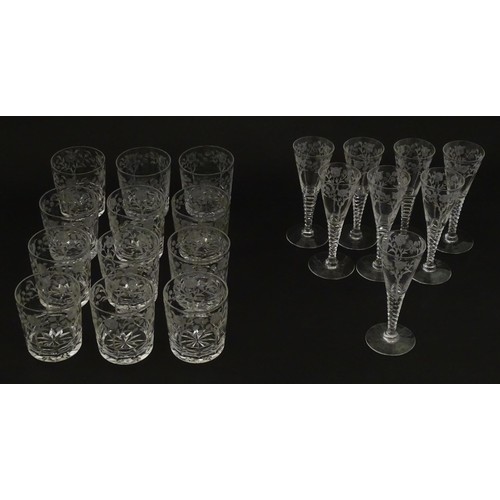 295 - A quantity of various crystal drinking glasses with cut decoration and etched rose detail, to includ... 