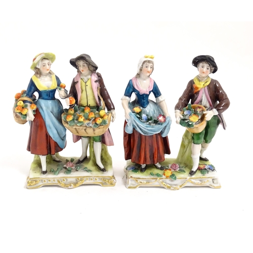 186 - Two Italian Capodimonte figure groups modelled as fruit gatherers with baskets of apples. Approx. 4