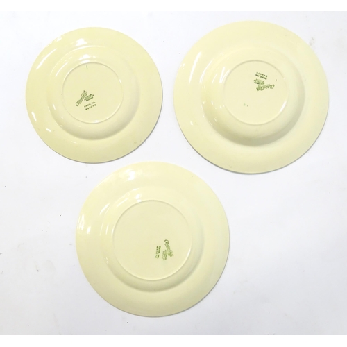 221 - A quantity of Clarice Cliff Art Deco dinner wares with green and gilt banded detail to include turee... 