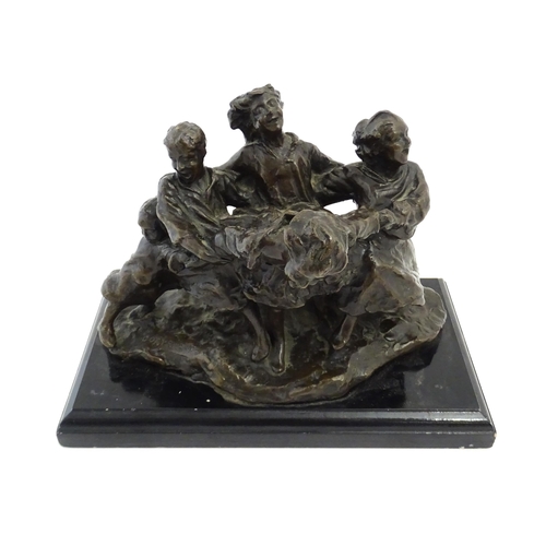 1028 - An early 20thC bronze figural group modelled as children playing. Raised on a rectangular wooden bas... 