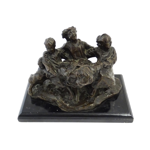 1028 - An early 20thC bronze figural group modelled as children playing. Raised on a rectangular wooden bas... 