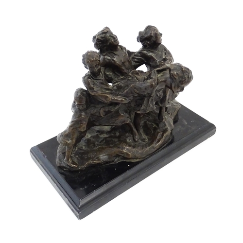 1028 - An early 20thC bronze figural group modelled as children playing. Raised on a rectangular wooden bas... 