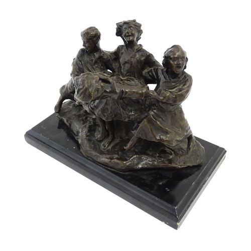 1028 - An early 20thC bronze figural group modelled as children playing. Raised on a rectangular wooden bas... 