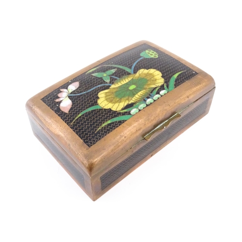 1059 - Five assorted items of Oriental black ground cloisonne comprising a box of rectangular form with flo... 