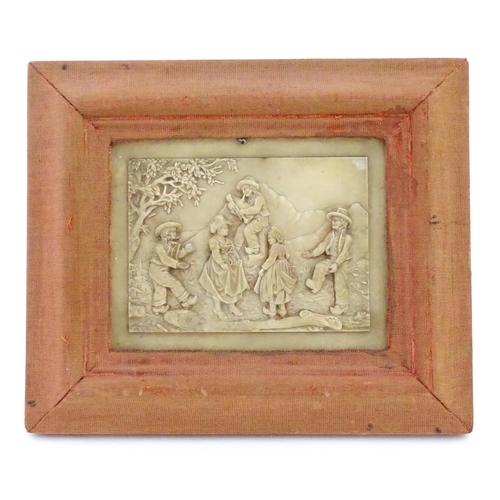 1159 - A Victorian wax plaque with relief and bas relief decoration depicting figures dancing in a landscap... 