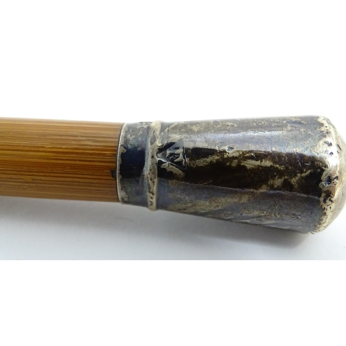 1298B - An Army Officer's swagger stick with silver top, hallmarked London 1907. Approx 28