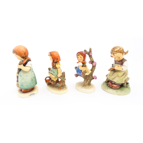 148 - A quantity of Hummel / Goebel figures to include Apple Tree Girl, no. 141, One Plus One no. 129, Ooh... 