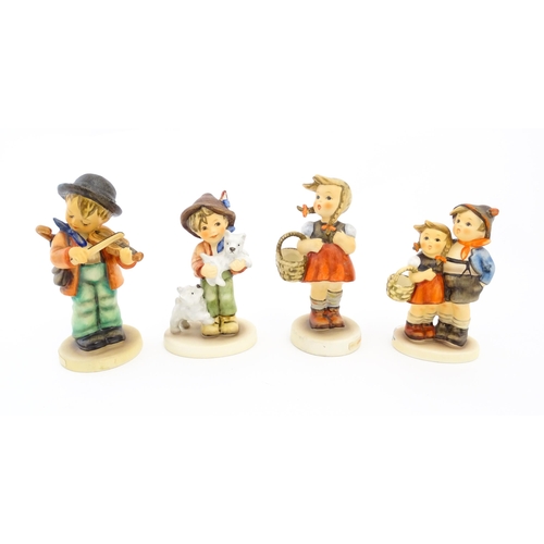 148 - A quantity of Hummel / Goebel figures to include Apple Tree Girl, no. 141, One Plus One no. 129, Ooh... 