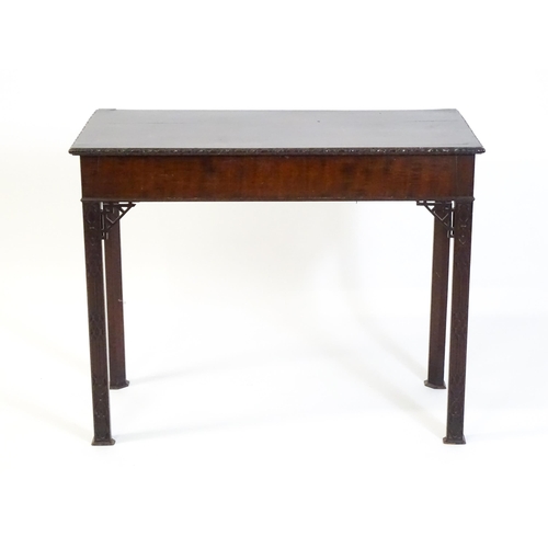 1488 - An early 19thC mahogany Chinese Chippendale side table, with a moulded edge above a single short dra... 