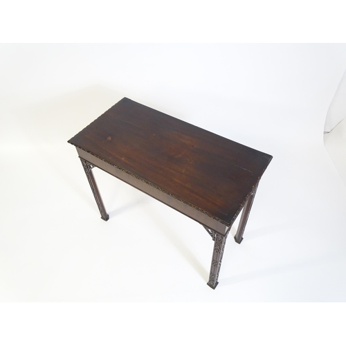 1488 - An early 19thC mahogany Chinese Chippendale side table, with a moulded edge above a single short dra... 