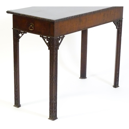 1488 - An early 19thC mahogany Chinese Chippendale side table, with a moulded edge above a single short dra... 