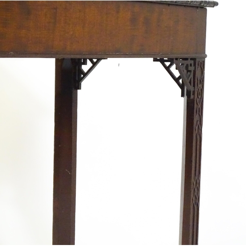 1488 - An early 19thC mahogany Chinese Chippendale side table, with a moulded edge above a single short dra... 