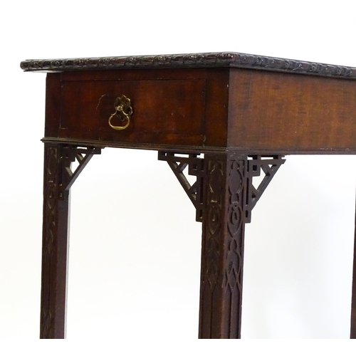 1488 - An early 19thC mahogany Chinese Chippendale side table, with a moulded edge above a single short dra... 