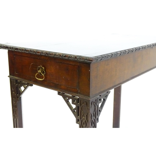 1488 - An early 19thC mahogany Chinese Chippendale side table, with a moulded edge above a single short dra... 