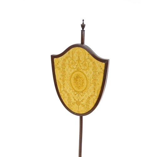 1618 - An early 20thC  pole screen with a shield shape embroidery raised on a turned pole and three cabriol... 